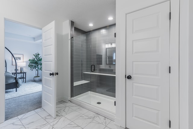 bathroom featuring tile floors and a shower with shower door