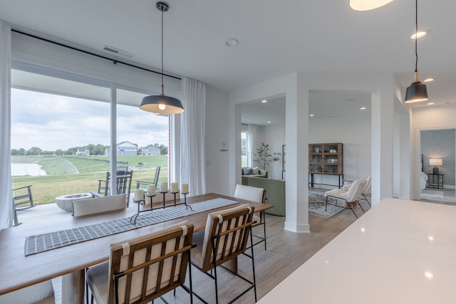 dining room featuring light hardwood / wood-style flooring