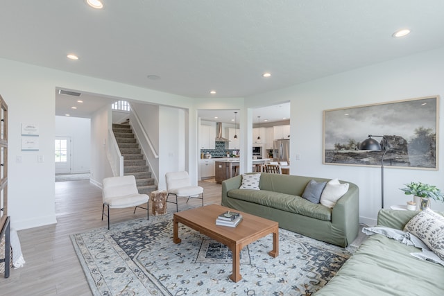 living room featuring light wood-type flooring