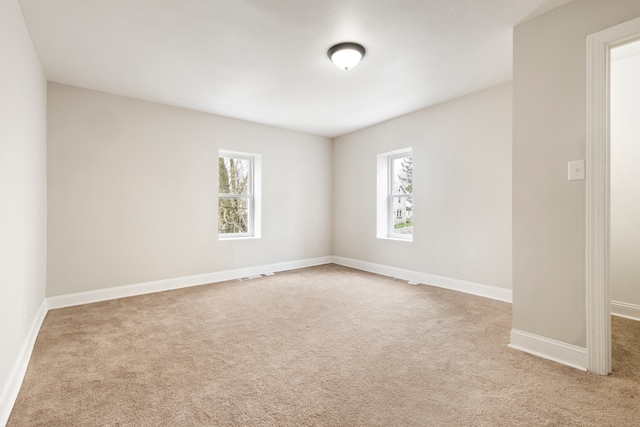 view of carpeted spare room