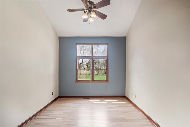 empty room with light hardwood / wood-style floors and ceiling fan