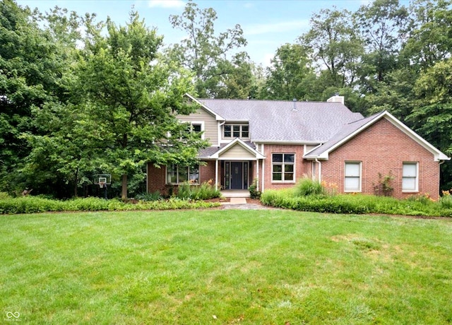 view of front of home with a front lawn