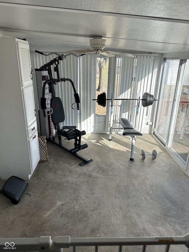 workout area with a textured ceiling