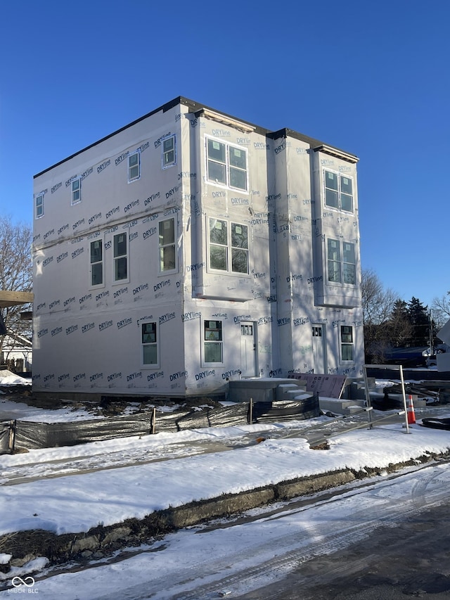 view of snow covered building