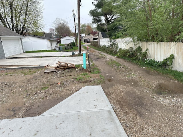 view of yard with a garage