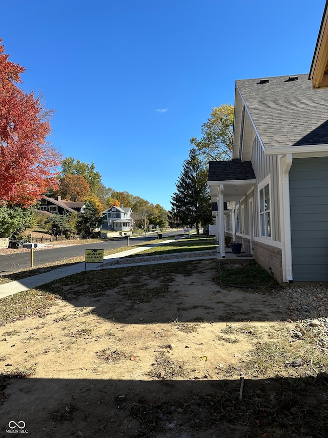 view of yard featuring a porch