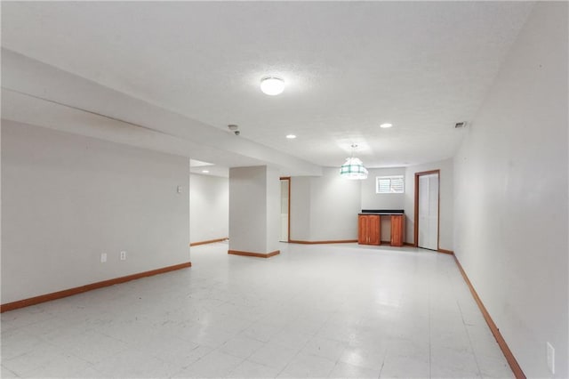 empty room featuring light tile flooring