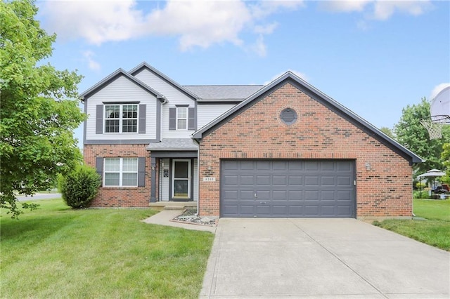 front of property featuring a garage and a front lawn