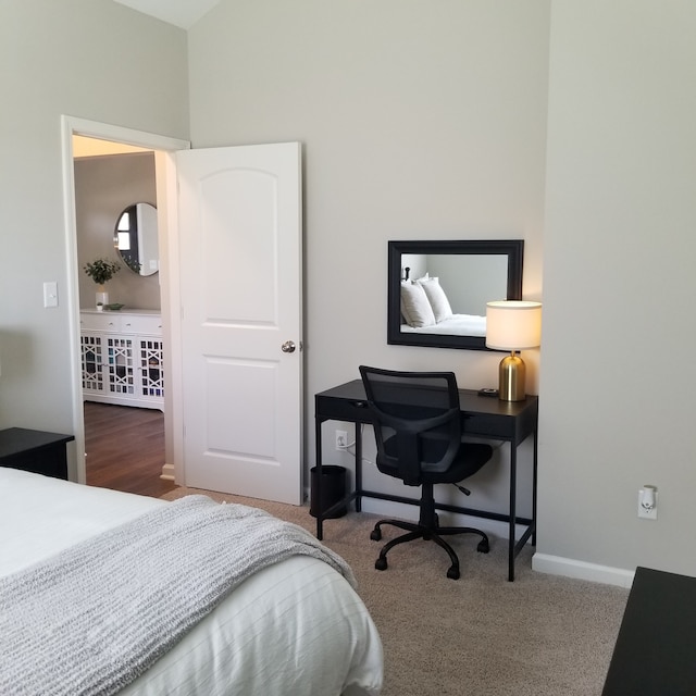 bedroom with dark carpet