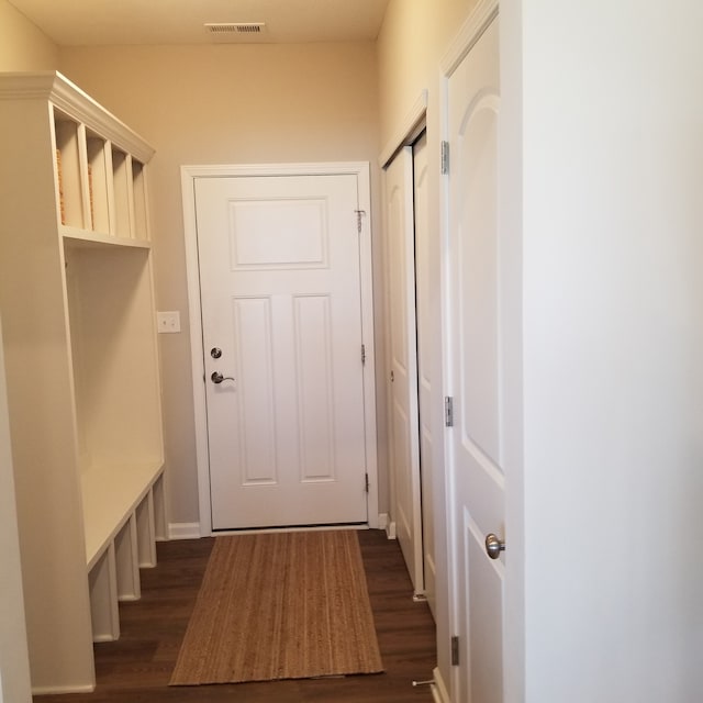 doorway to outside featuring dark hardwood / wood-style flooring