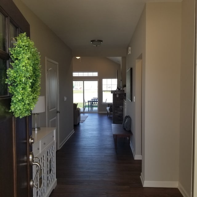 corridor featuring dark hardwood / wood-style floors