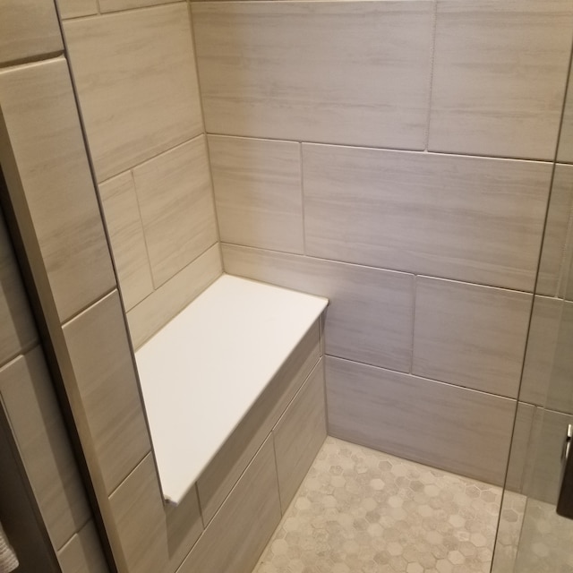 bathroom featuring walk in shower