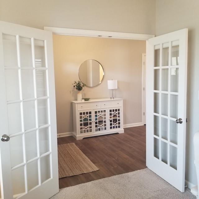 interior space featuring dark hardwood / wood-style floors and french doors