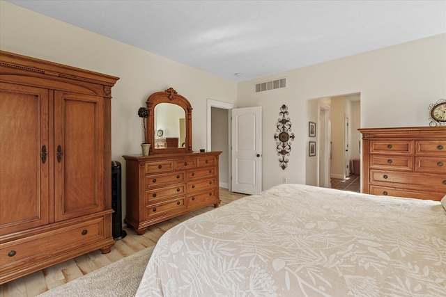 bedroom featuring light hardwood / wood-style floors