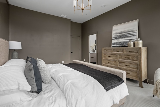 bedroom with light carpet and a notable chandelier