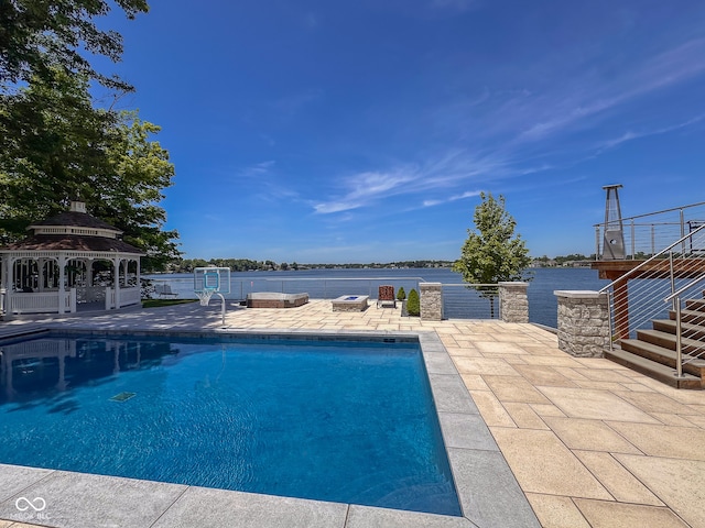 view of pool with a patio area and a gazebo