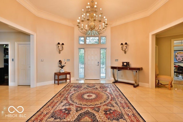 entryway with a notable chandelier, ornamental molding, and light tile floors