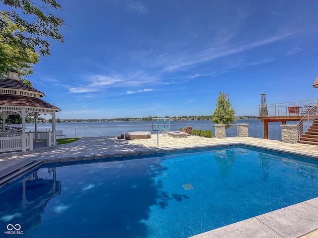 view of swimming pool with a gazebo