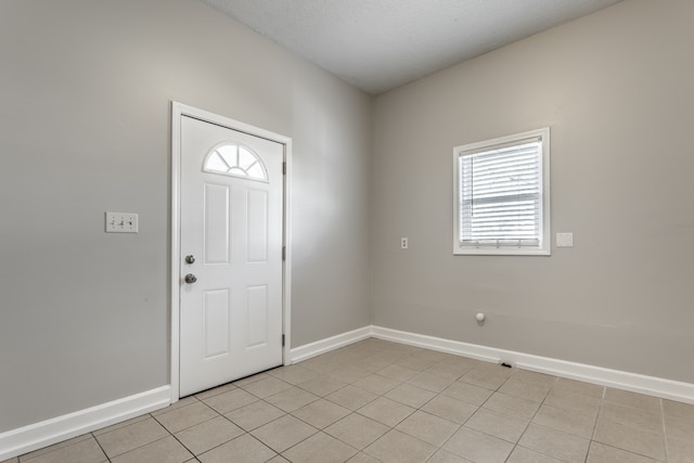 view of tiled foyer entrance