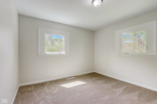 view of carpeted spare room