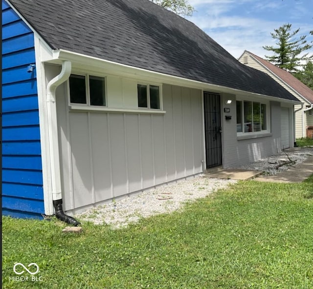 exterior space featuring a front lawn