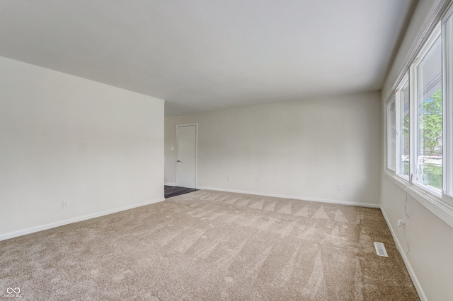 spare room with carpet