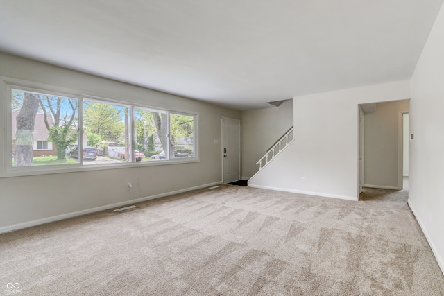 view of carpeted spare room