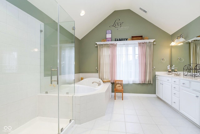 bathroom featuring tile patterned flooring, vanity, lofted ceiling, and plus walk in shower