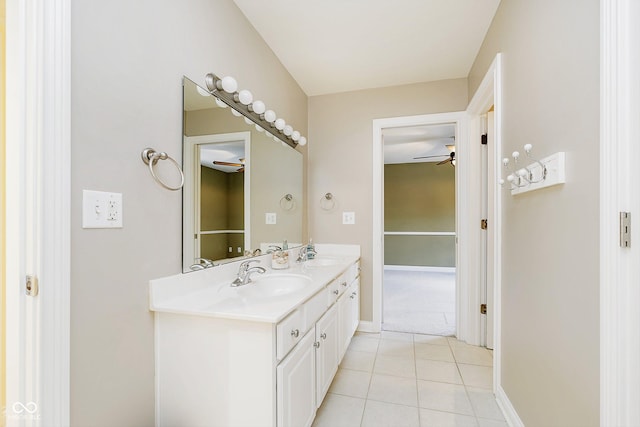 bathroom featuring tile patterned flooring and vanity