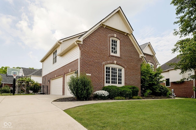 view of front of home with a garage and a front yard