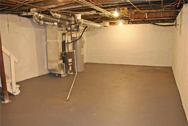 basement featuring water heater