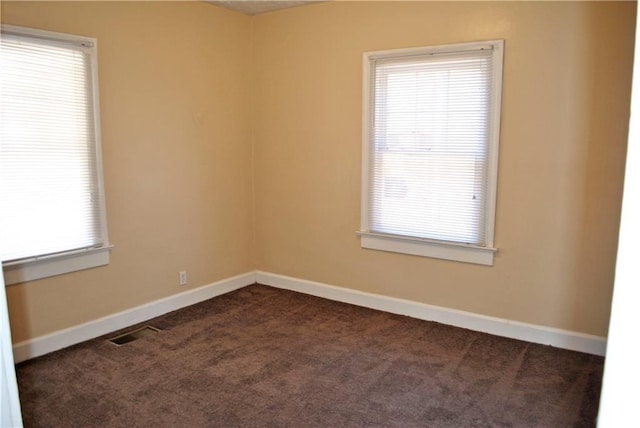 view of carpeted spare room