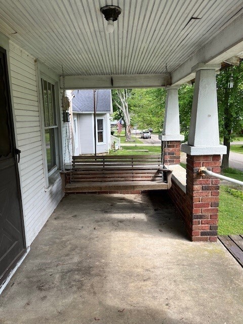 view of patio featuring covered porch