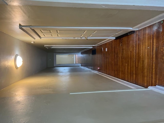 garage with wood walls