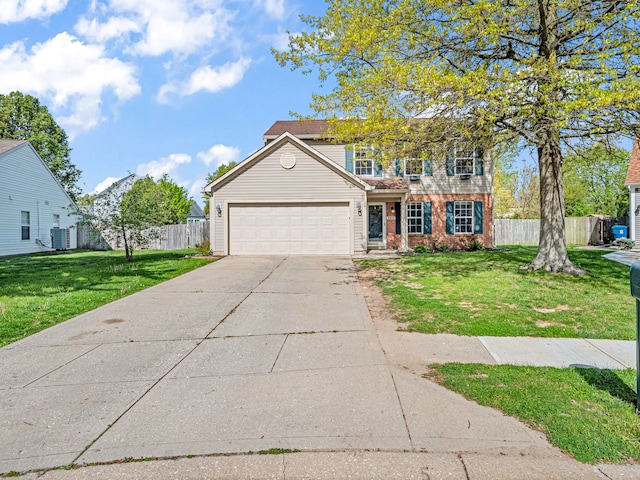 view of front of property featuring a garage, central AC, and a front lawn