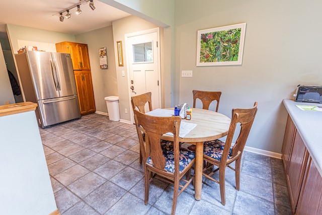 dining space with track lighting