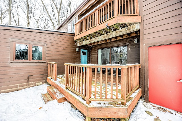 view of snow covered deck