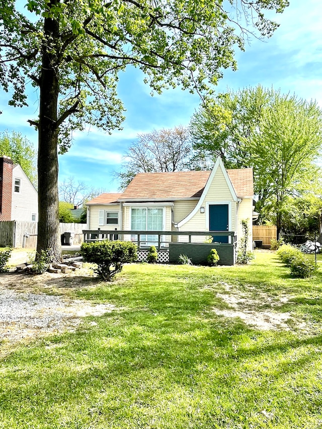 view of front of home with a front yard