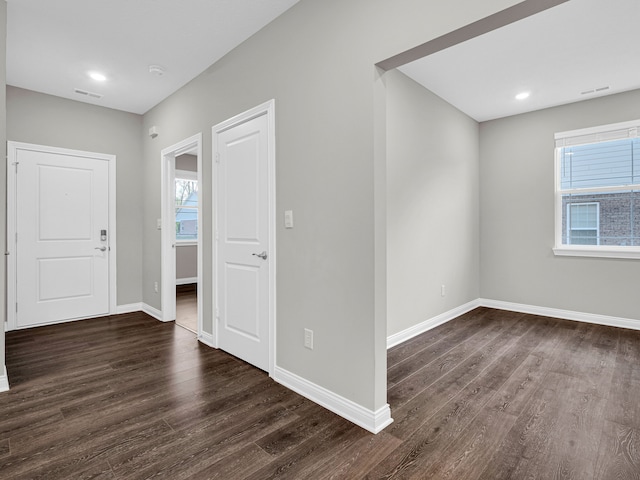 entrance foyer featuring dark hardwood / wood-style floors