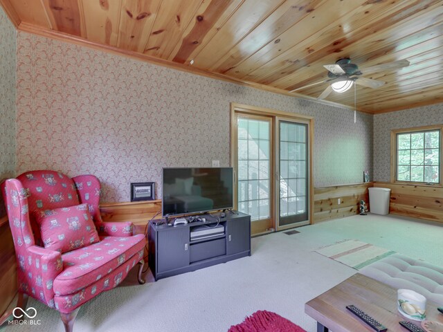 6486 Coyote Dr, Nineveh, IN 46164 - living room with wallpapered walls, ornamental molding, carpet floors, wood ceiling, and a ceiling fan