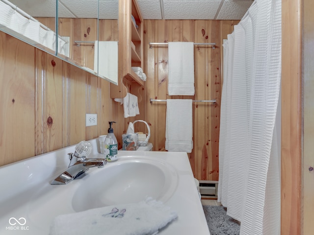 6486 Coyote Dr, Nineveh, IN 46164 - bathroom featuring wood walls, a baseboard radiator, and vanity