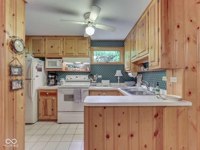 6486 Coyote Dr, Nineveh, IN 46164 - kitchen featuring white appliances, a sink, a peninsula, light countertops, and light tile patterned floors