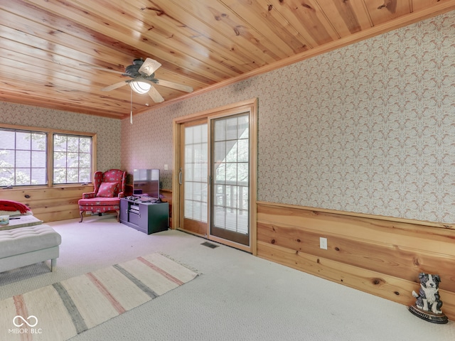6486 Coyote Dr, Nineveh, IN 46164 - living area featuring wallpapered walls, carpet flooring, ornamental molding, ceiling fan, and wooden ceiling