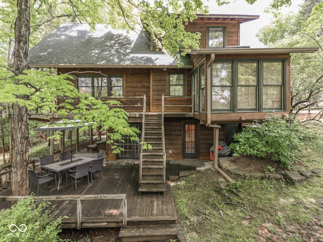 6486 Coyote Dr, Nineveh, IN 46164 - rear view of property featuring a deck and a sunroom