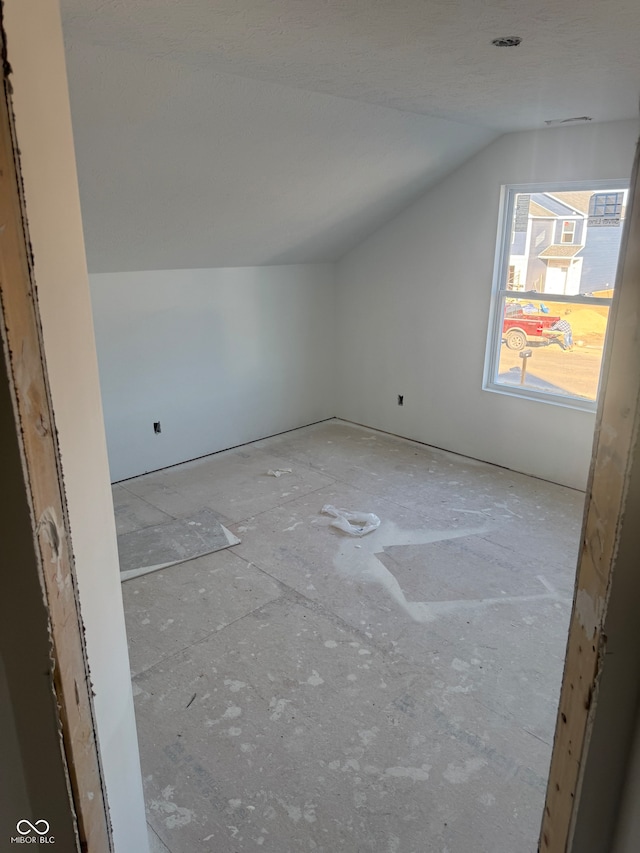 bonus room with lofted ceiling