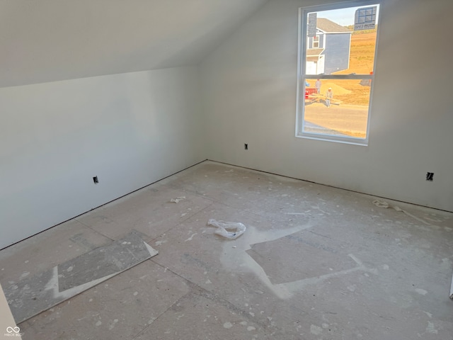 bonus room with lofted ceiling and plenty of natural light