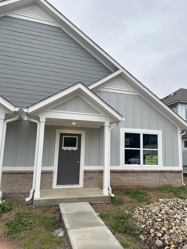 entrance to property with a porch