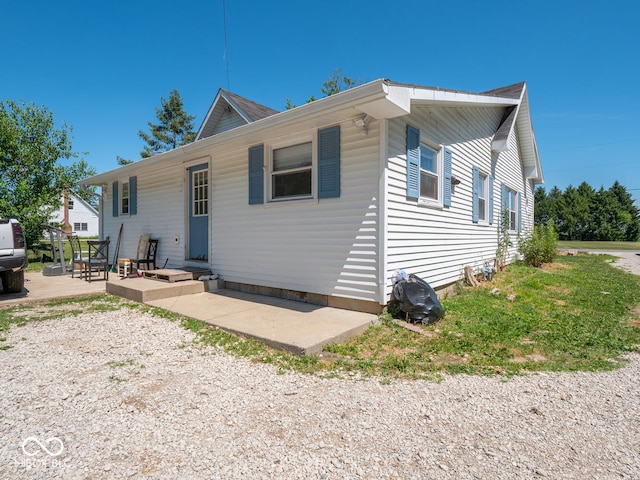 back of property with a patio area