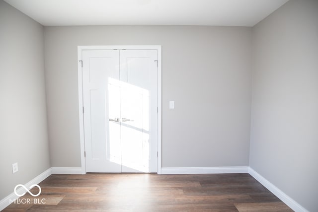 empty room featuring dark hardwood / wood-style floors