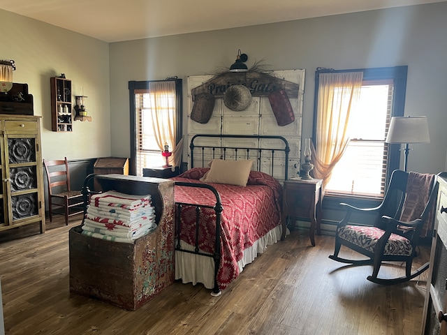 bedroom with hardwood / wood-style floors